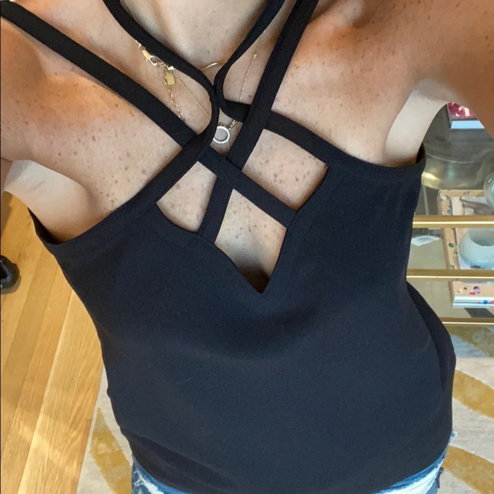 Simple black strapless top w cross cross details
